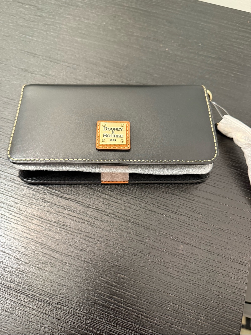 Dooney & Bourke Black Leather Phone Case with Gold Plaque